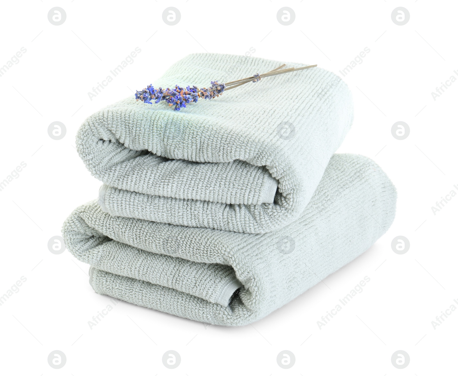 Photo of Soft towels and lavender isolated on white