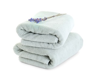 Photo of Soft towels and lavender isolated on white