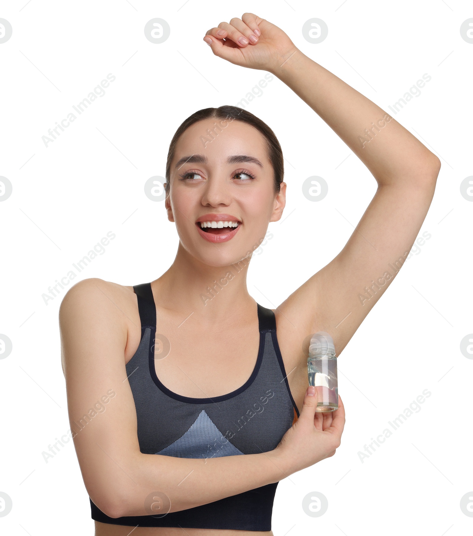 Photo of Beautiful woman applying deodorant on white background