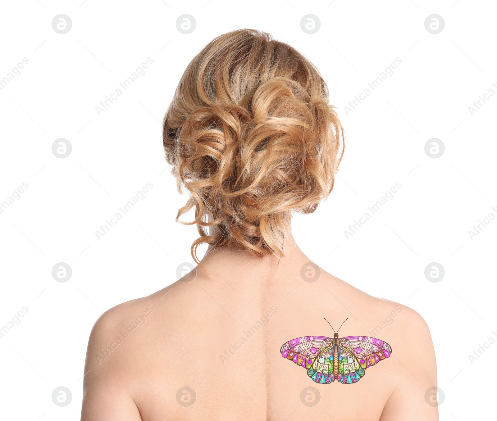 Image of Young woman with colorful tattoo of butterfly on her body against white background, back view