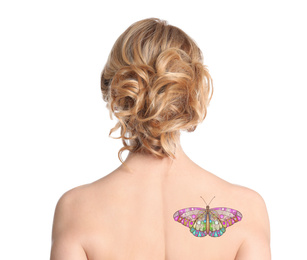 Image of Young woman with colorful tattoo of butterfly on her body against white background, back view