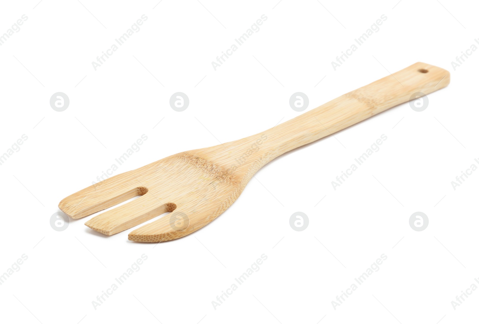 Photo of Wooden fork isolated on white. Cooking utensil