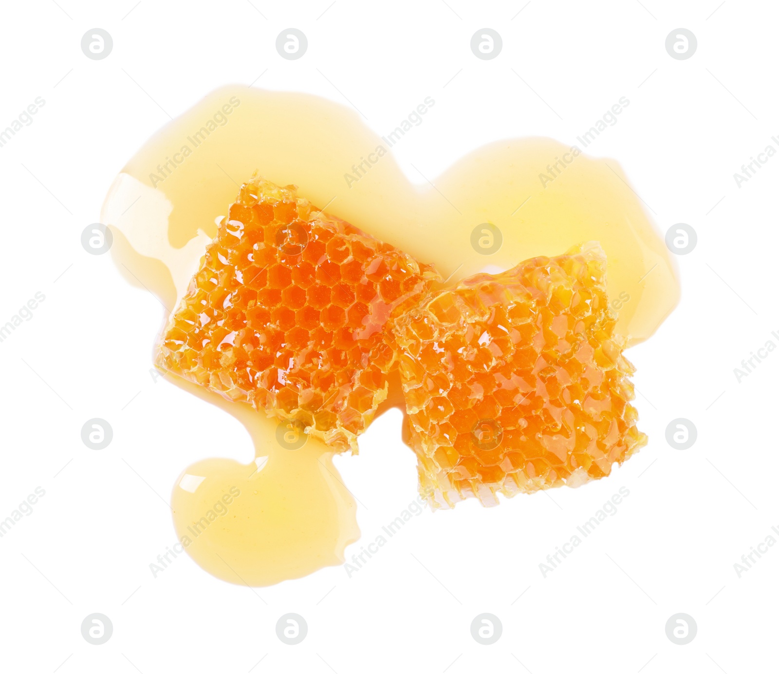 Photo of Natural honeycombs with tasty honey isolated on white, top view