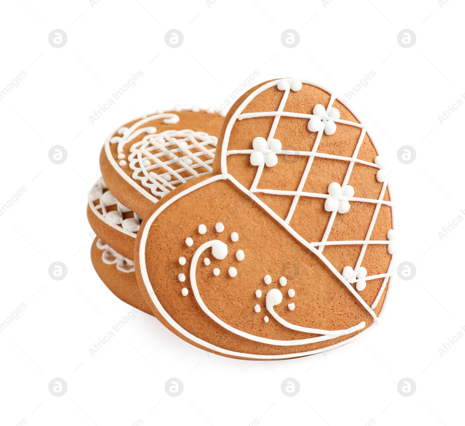 Photo of Gingerbread hearts decorated with icing on white background