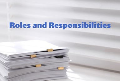 Image of Roles and Responsibilities concept. Stack of paper on window sill indoors