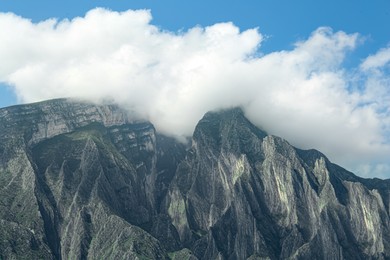 Photo of Picturesque view of beautiful mountain under cloudy sky