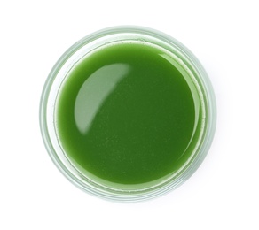 Photo of Glass of fresh wheat grass juice on white background, top view