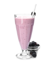 Photo of Tasty fresh milk shake and blackberries on white background