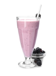 Tasty fresh milk shake and blackberries on white background