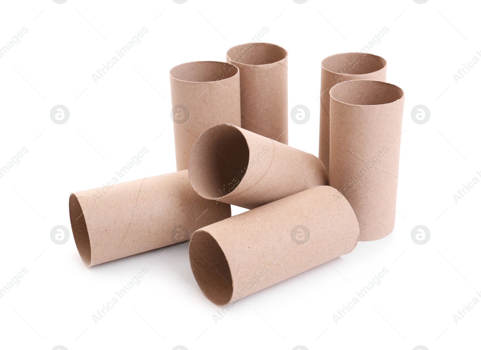 Photo of Empty paper toilet rolls on white background