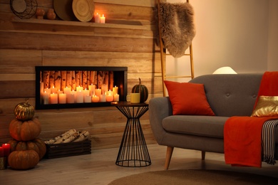 Photo of Cozy living room interior inspired by autumn colors