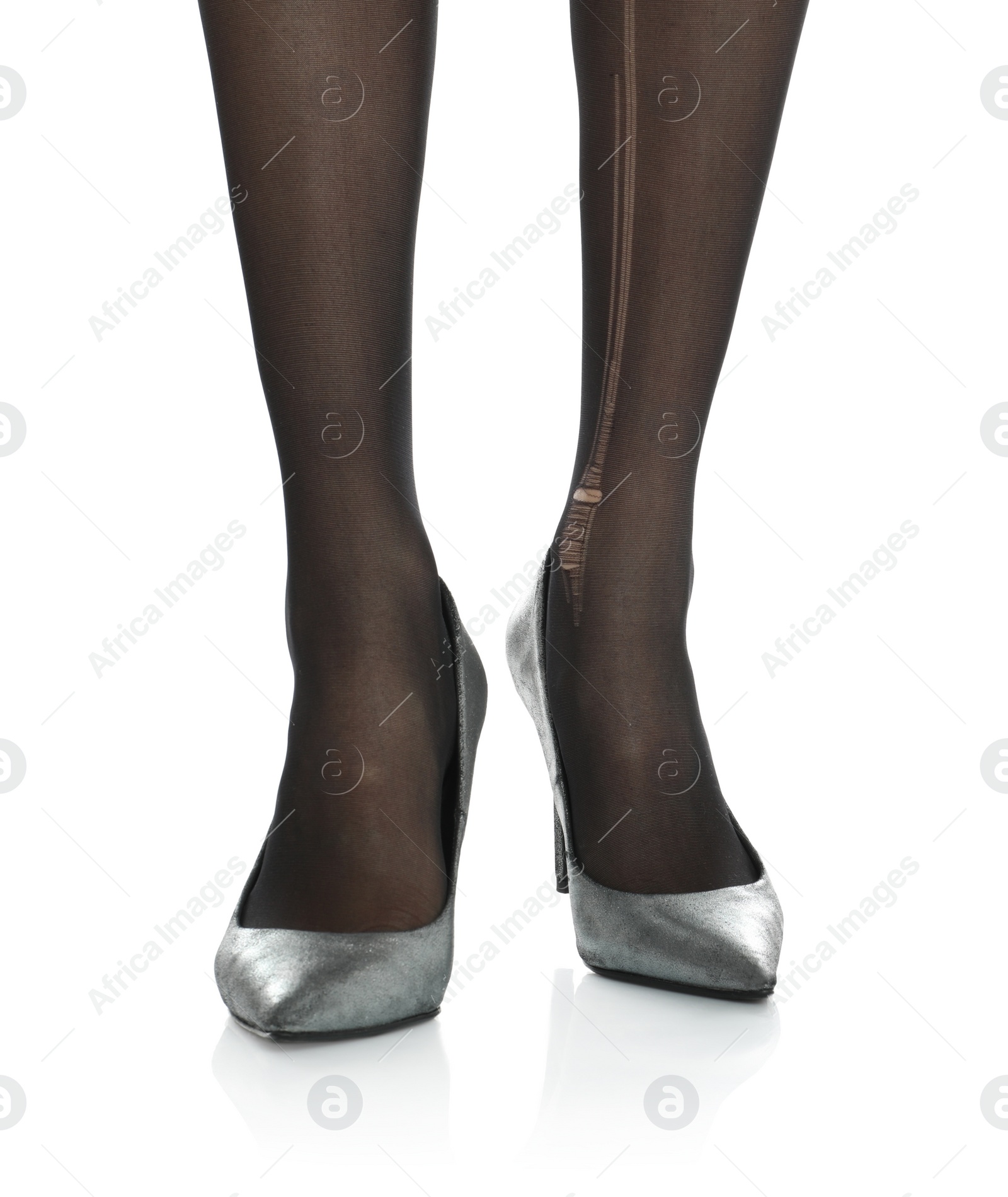 Photo of Woman wearing torn tights on white background, closeup