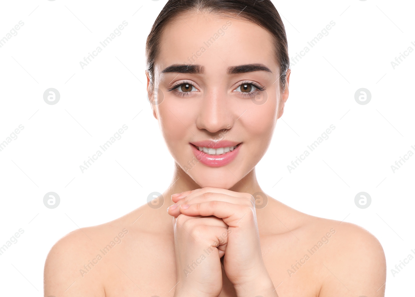 Photo of Portrait of young woman with beautiful face against white background