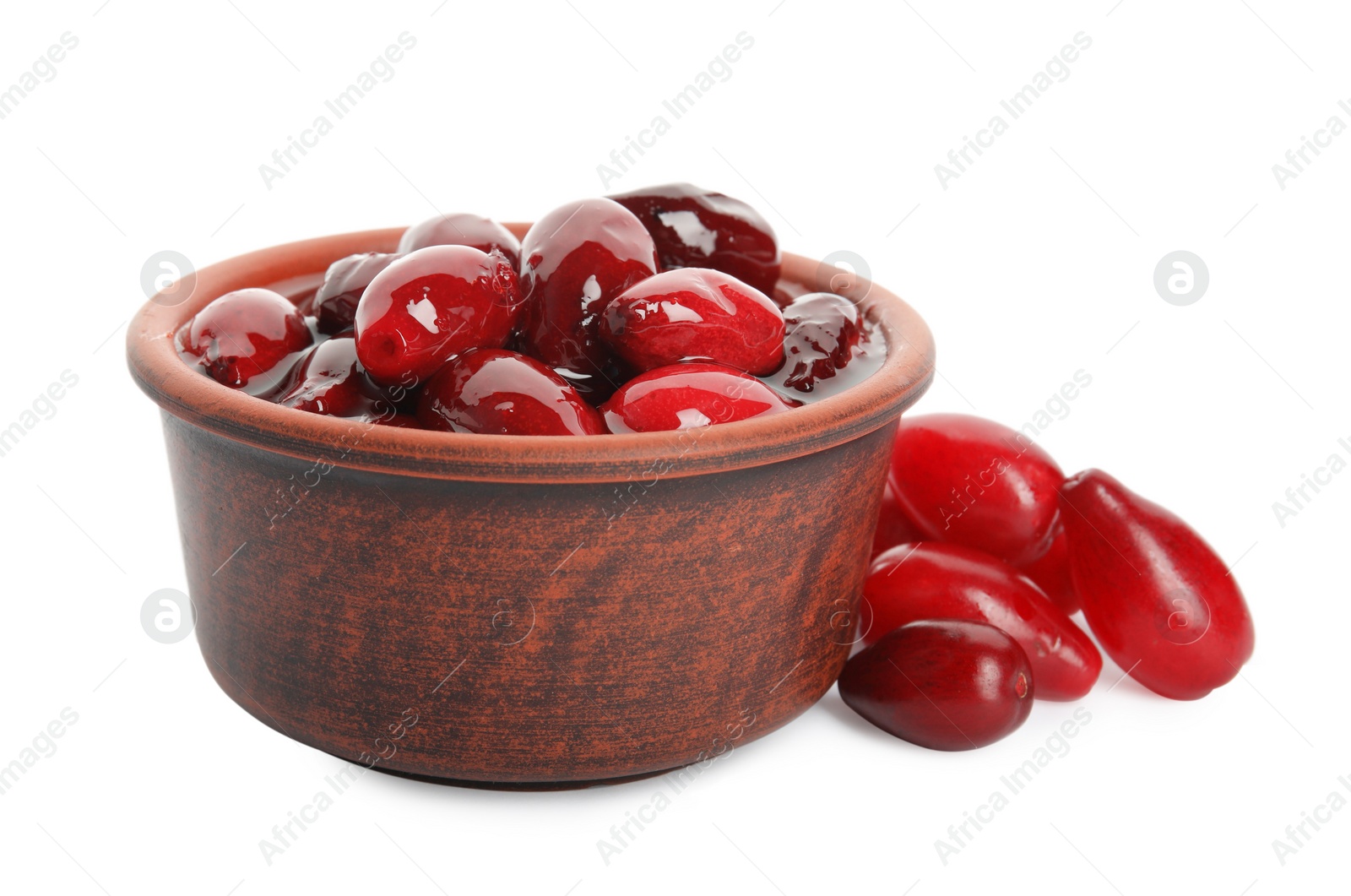 Photo of Delicious dogwood jam with berries and bowl on white background