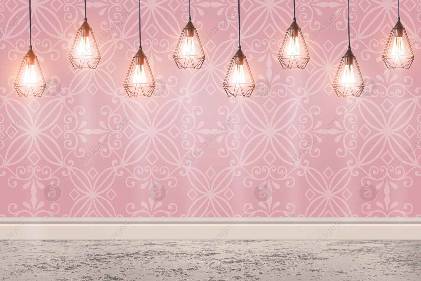 Image of Pink patterned wallpaper and glowing hanging lamps in room