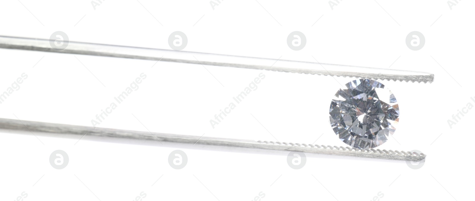 Photo of Tweezers with beautiful shiny diamond isolated on white