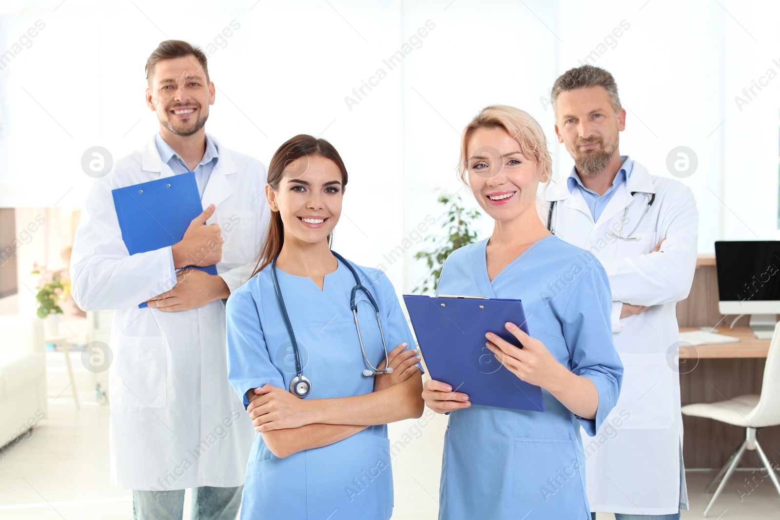 Photo of Doctors and medical assistants in clinic. Health care service