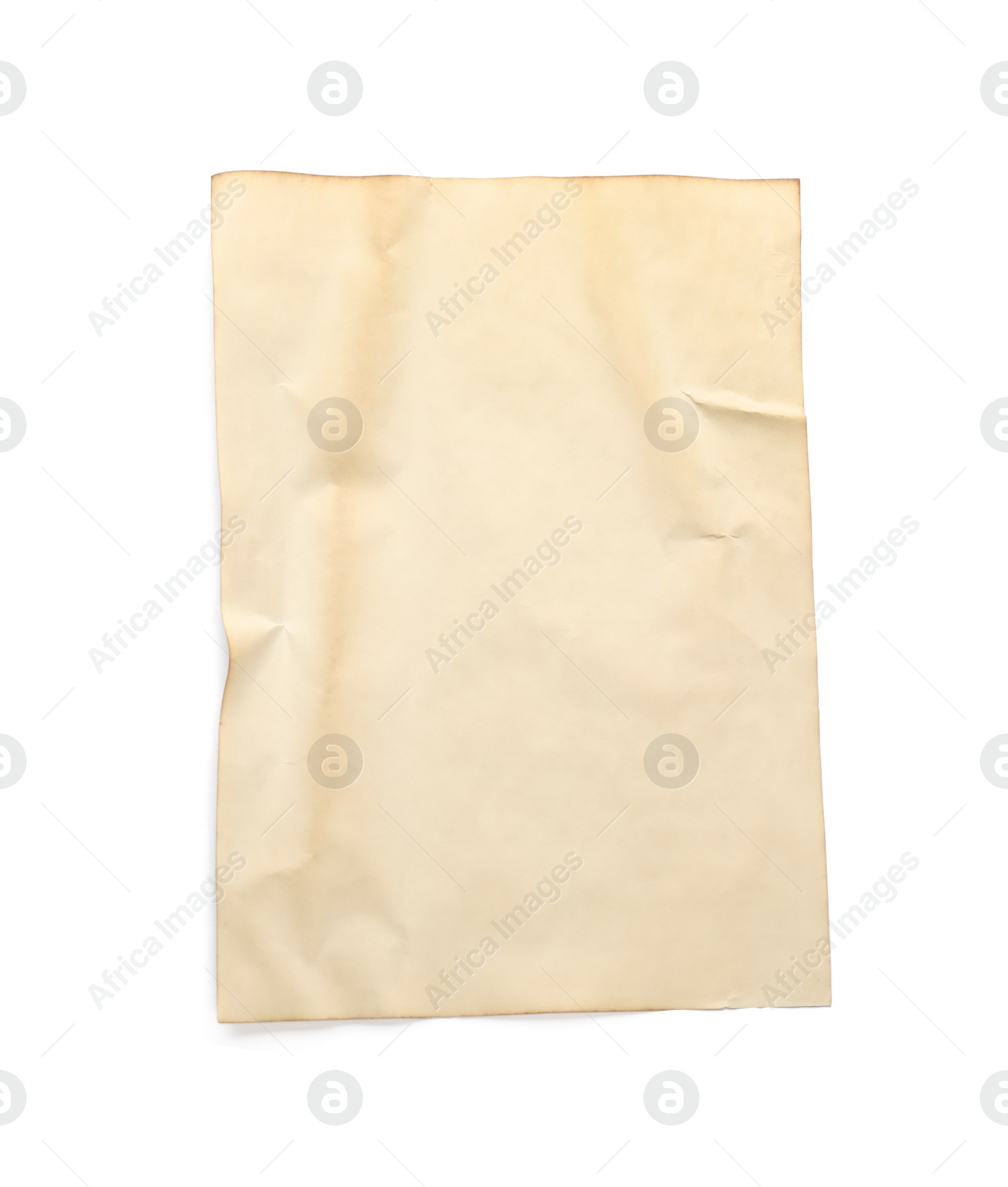 Photo of Sheet of old parchment paper isolated on white, top view. Space for design