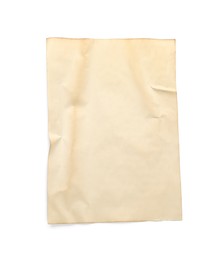 Photo of Sheet of old parchment paper isolated on white, top view. Space for design