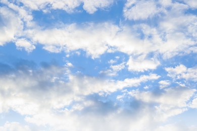 Photo of Picturesque view of beautiful fluffy clouds in light blue sky