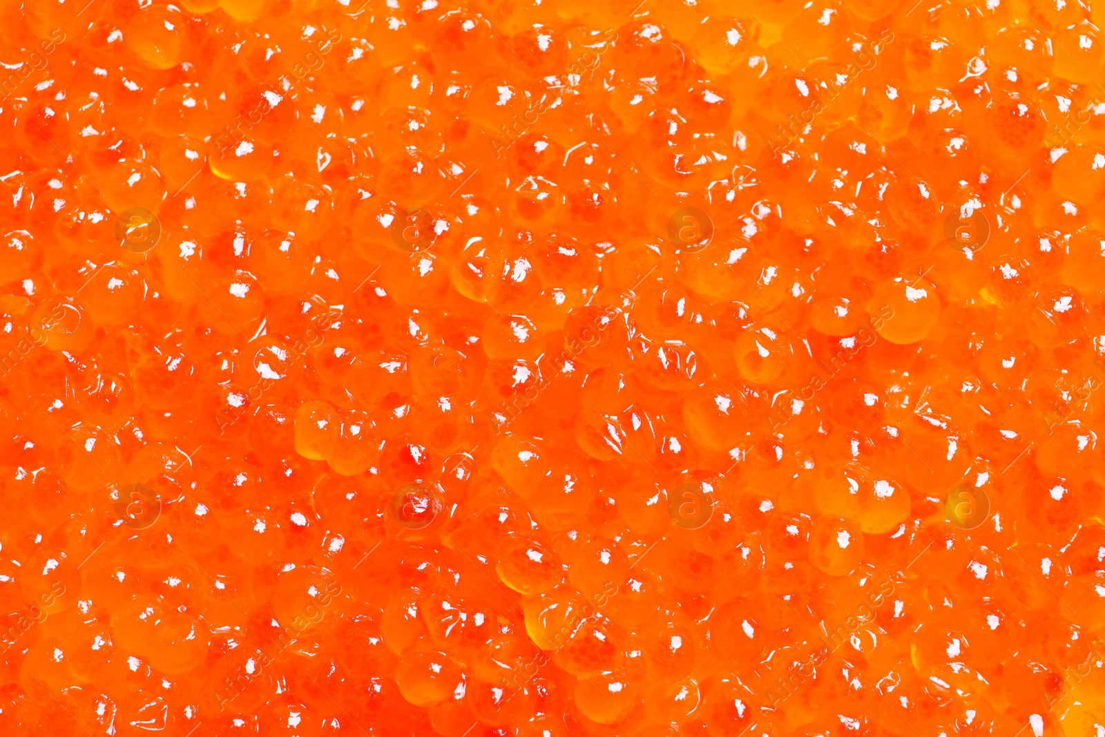 Photo of Delicious red caviar, closeup