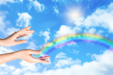 Woman and rainbow as source of healing energy on sunny day, closeup