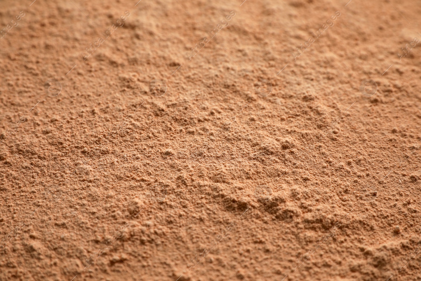 Photo of Loose face powder as background, closeup view