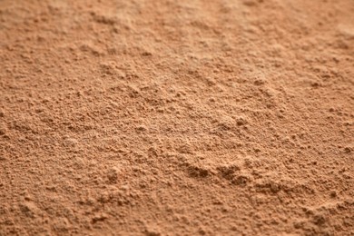 Photo of Loose face powder as background, closeup view