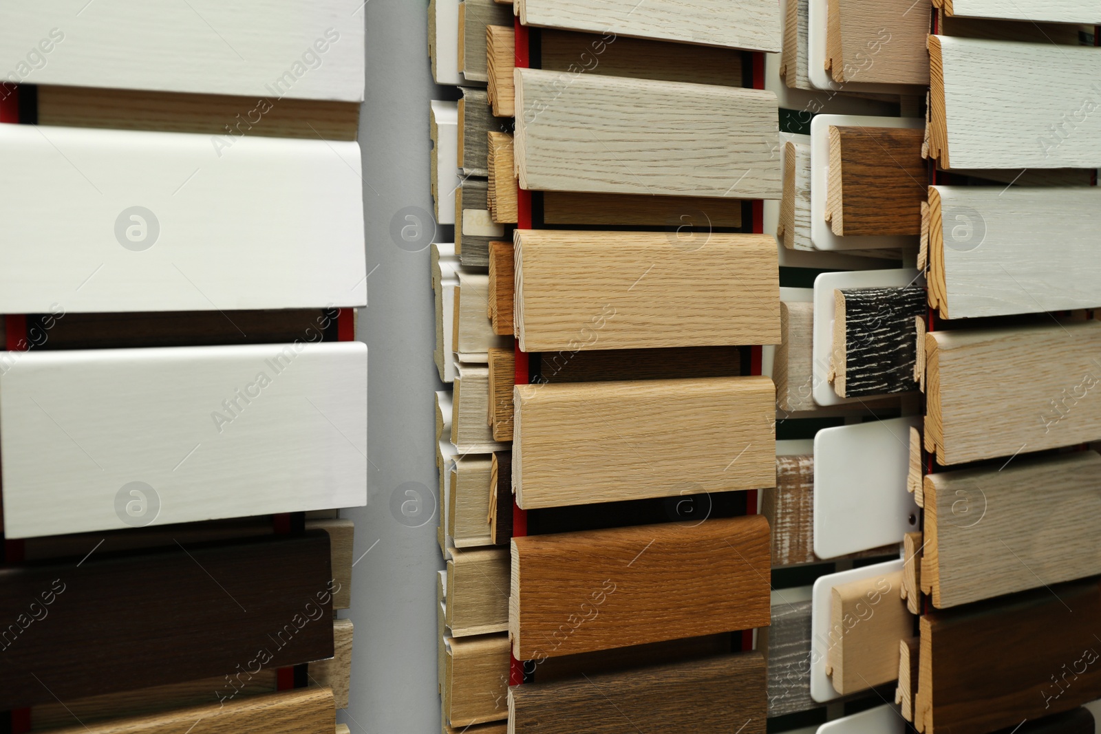 Photo of Many different samples of wooden flooring in store