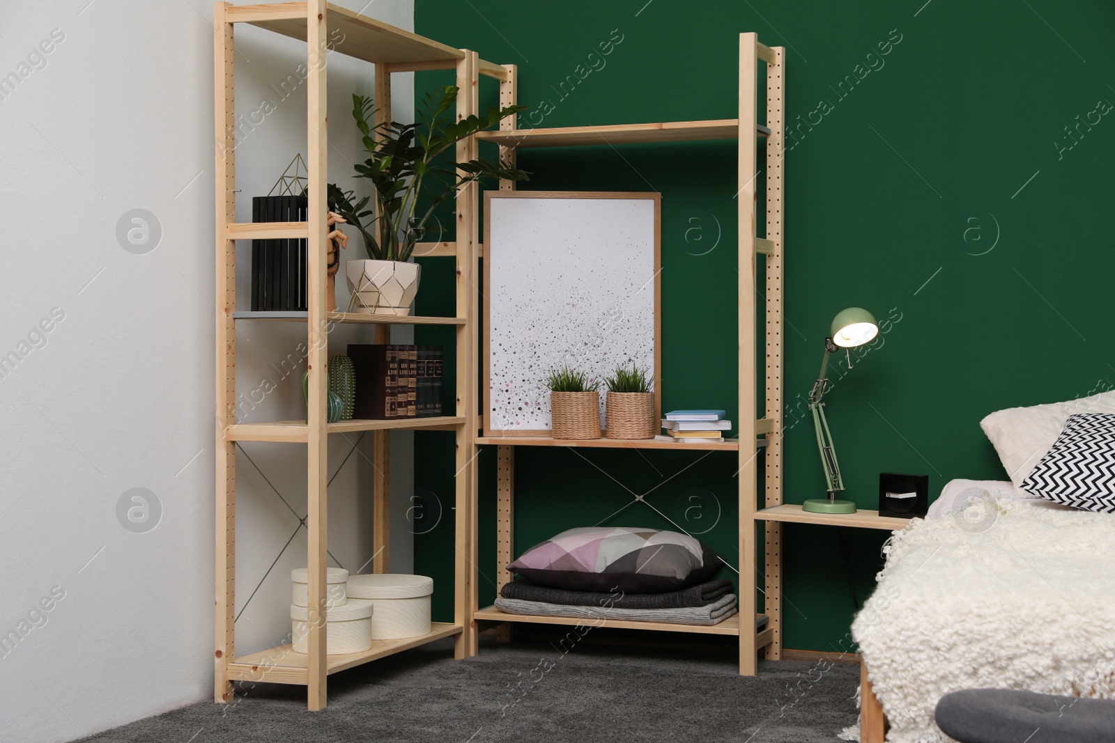 Photo of Wooden storage in stylish bedroom. Idea for interior design