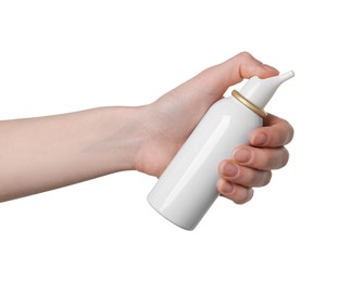 Woman holding nasal spray on white background, closeup