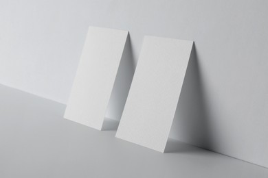 Blank business cards on white background. Mockup for design