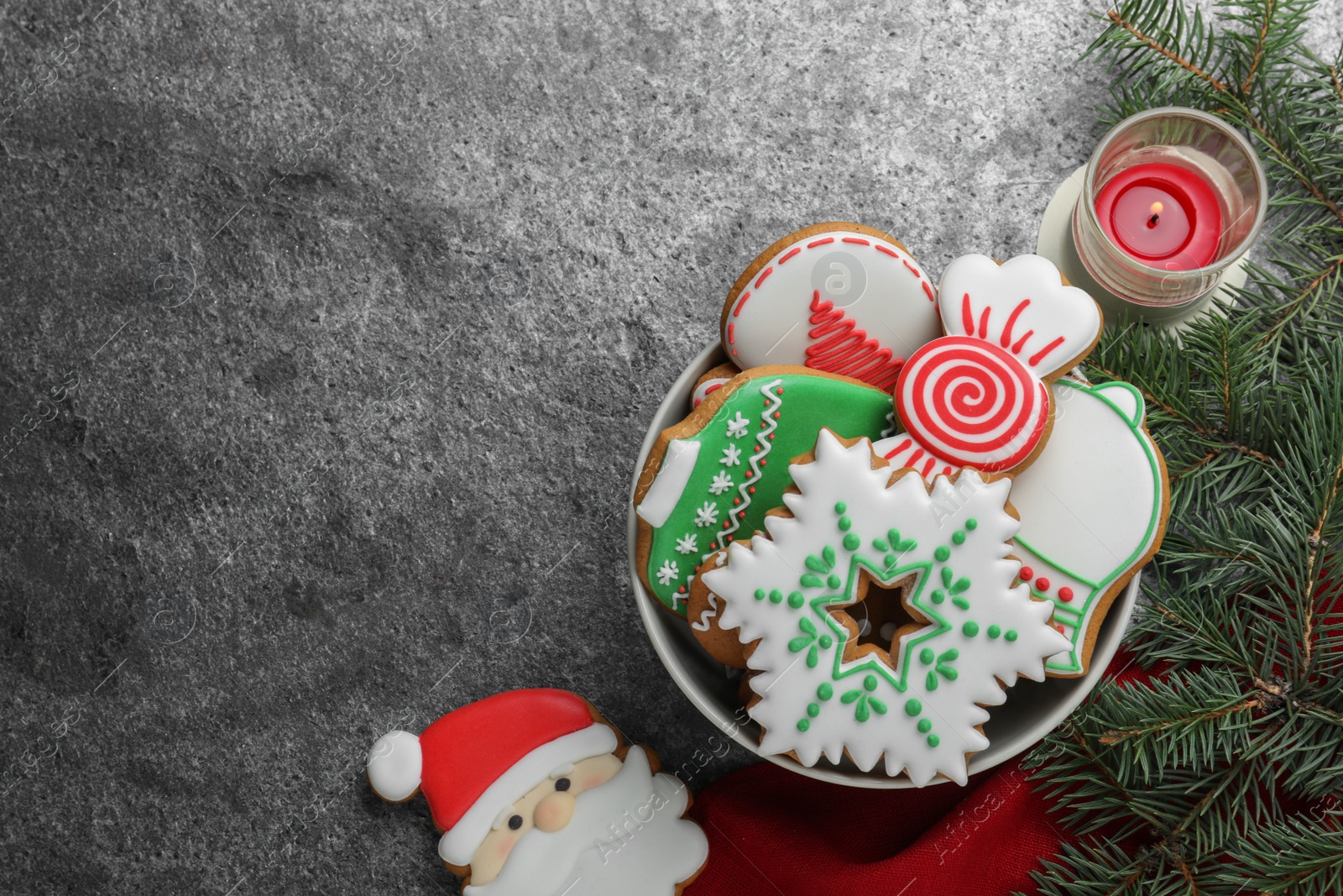 Photo of Delicious Christmas cookies on grey table, flat lay. Space for text