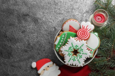 Delicious Christmas cookies on grey table, flat lay. Space for text