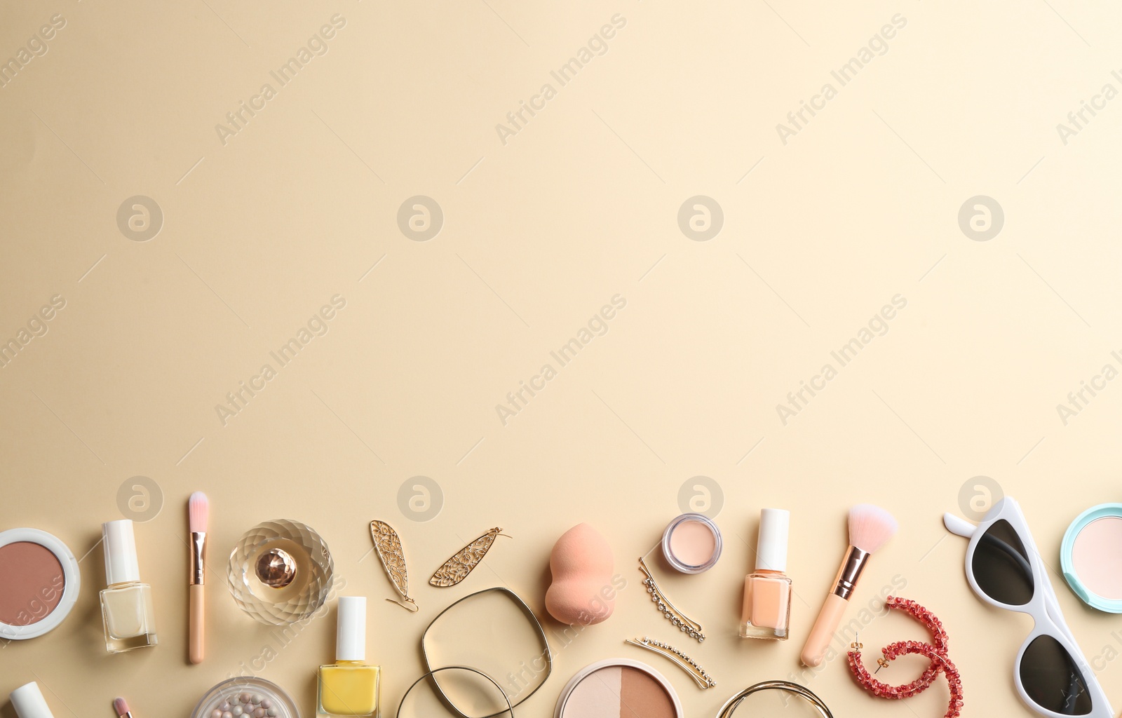Photo of Composition with perfume bottle, cosmetics and accessories on color background, flat lay. Space for text