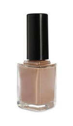 Beige nail polish in bottle isolated on white