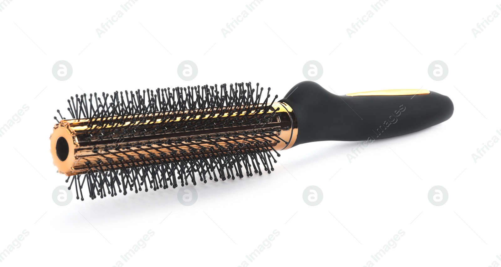 Photo of New round hair brush isolated on white