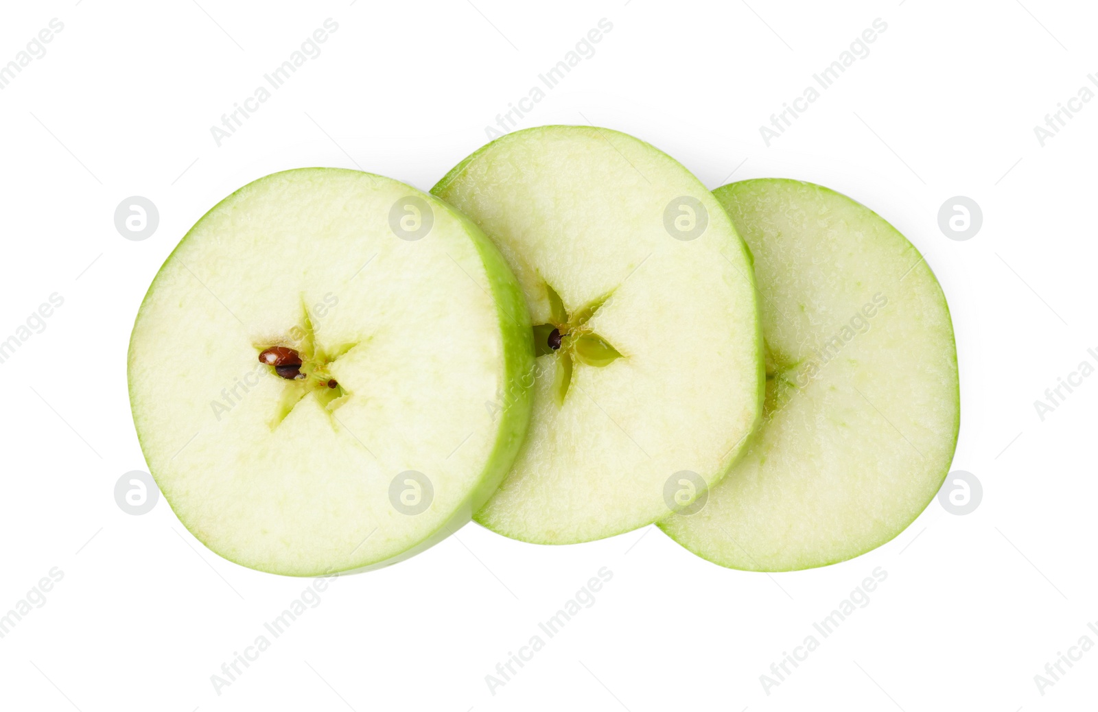 Photo of Slices of ripe green apple isolated on white, top view