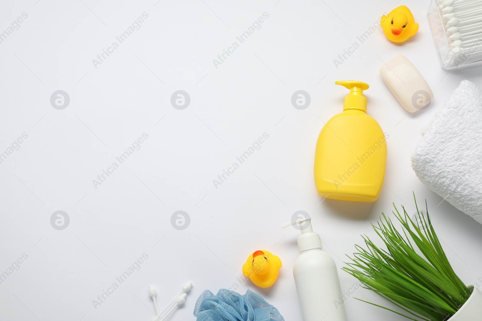 Photo of Baby bath accessories and care products on white background, flat lay. Space for text