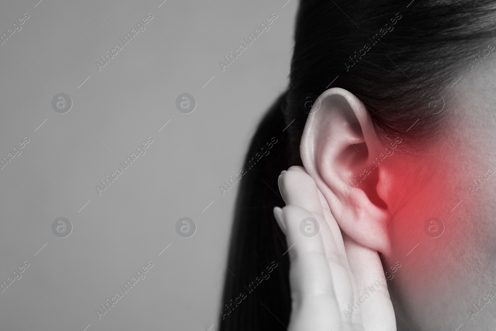 Image of Woman with hearing problem, space for text. Black and white tone