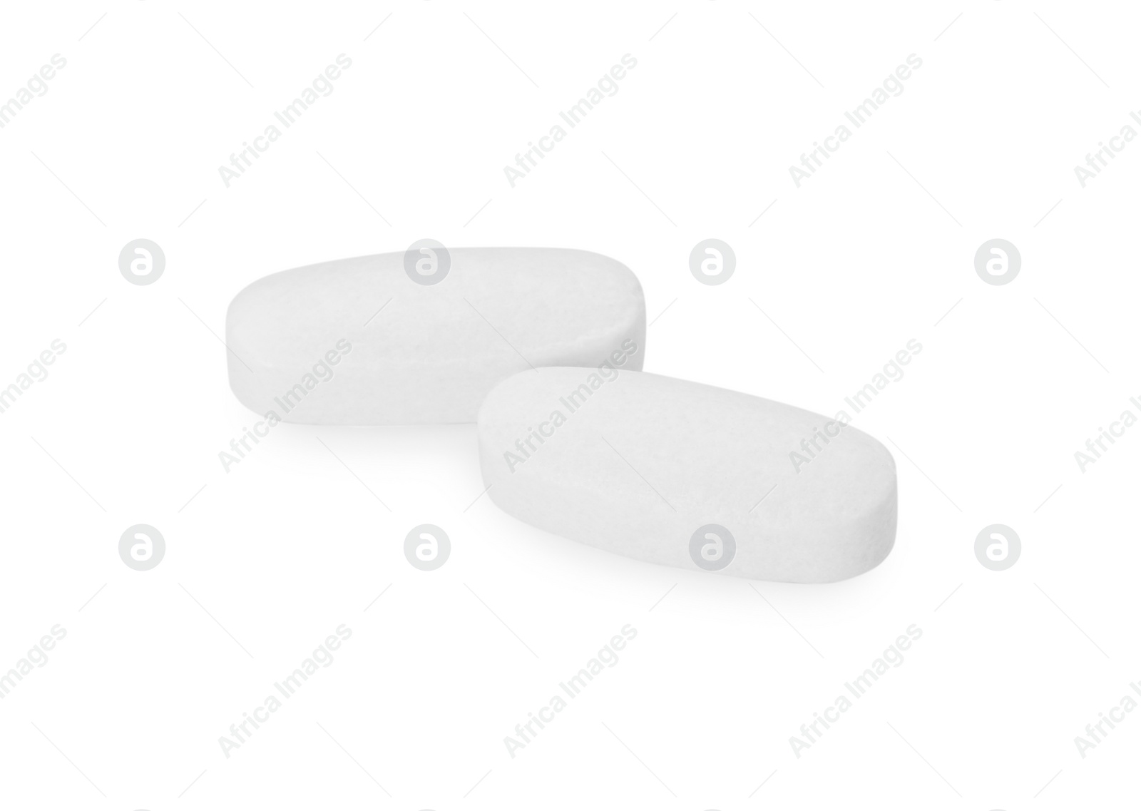 Photo of Vitamin pills isolated on white. Health supplement