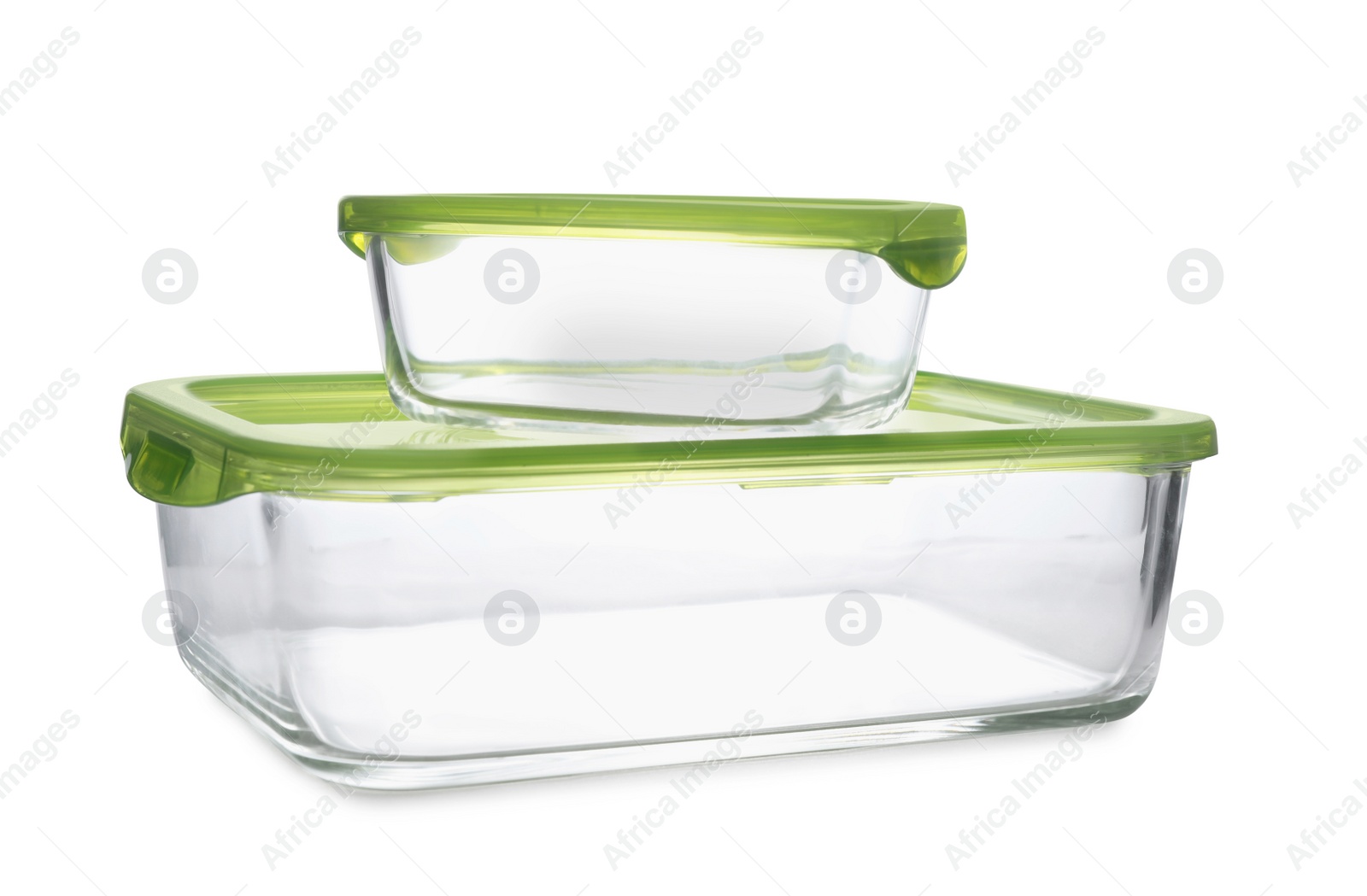 Photo of Empty glass containers for food on white background