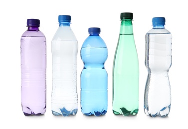 Photo of Plastic bottles with water isolated on white