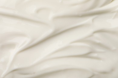 Photo of Delicious organic yogurt as background, top view