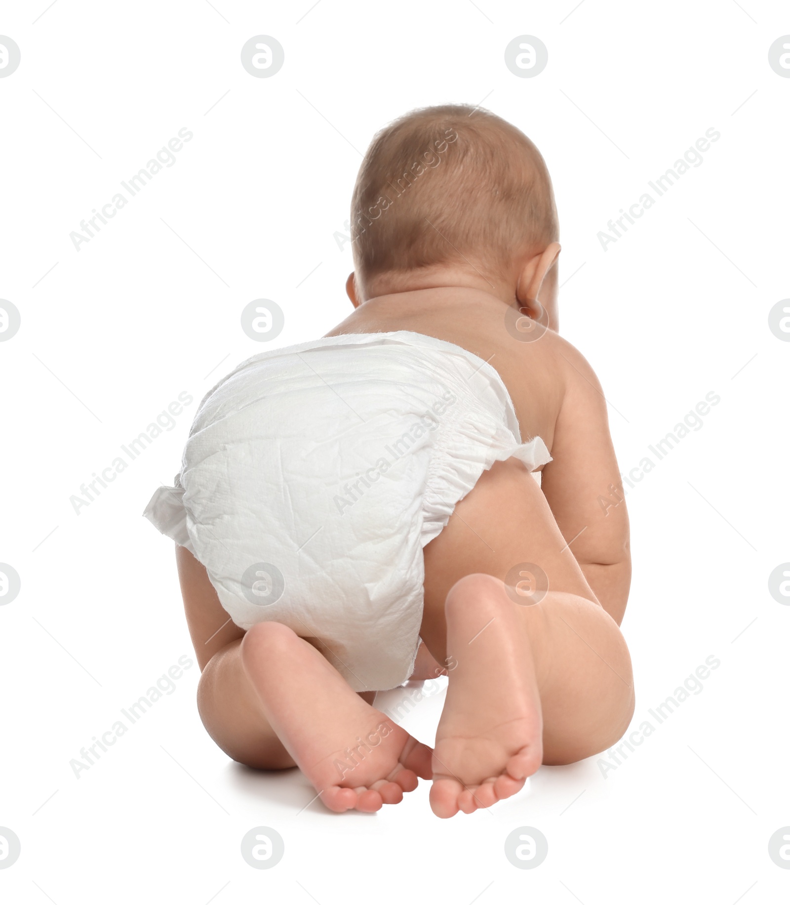 Photo of Cute little baby in diaper crawling on white background, back view