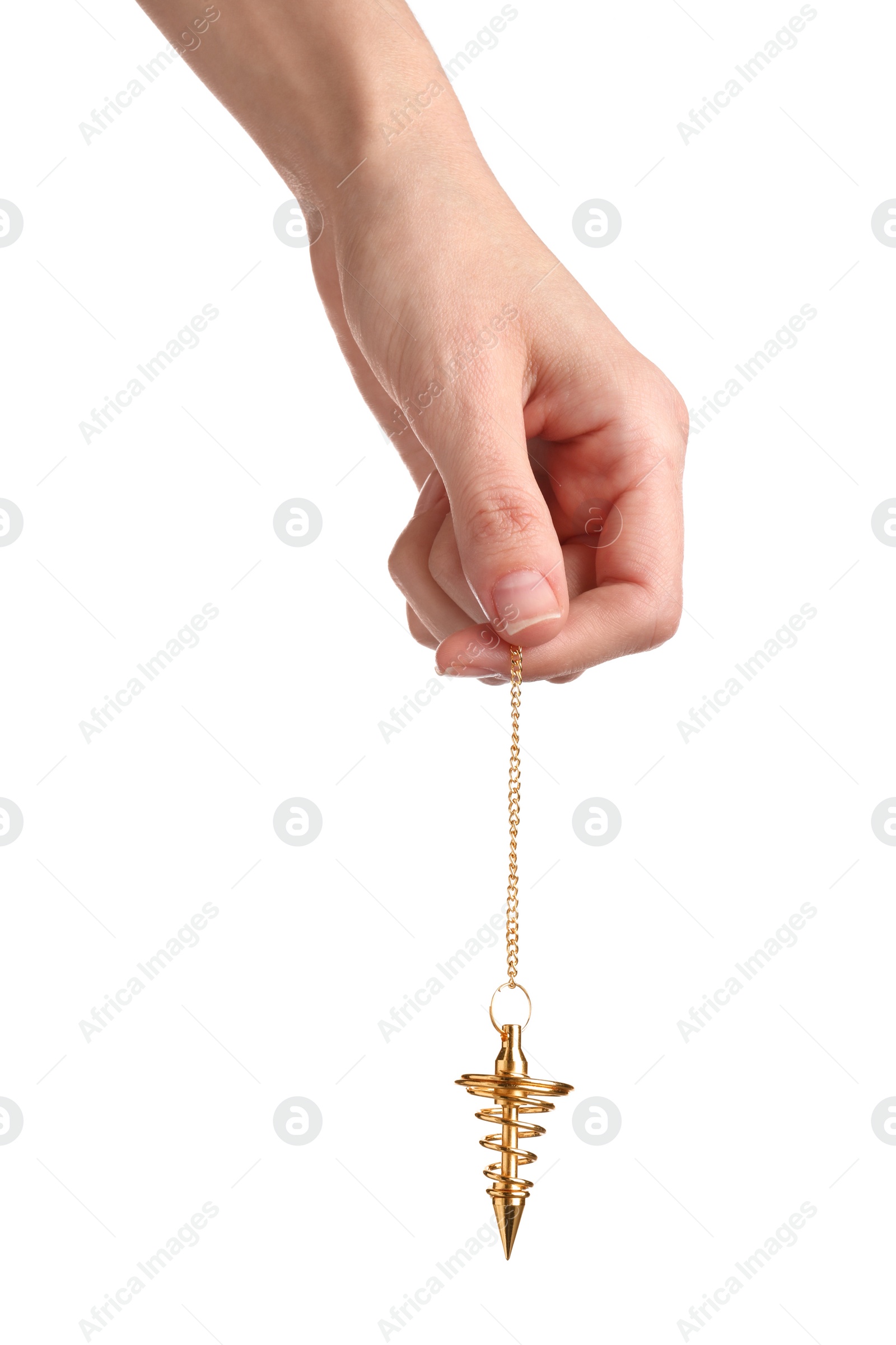 Photo of Woman holding golden pendulum with chain on white background, closeup. Hypnosis session