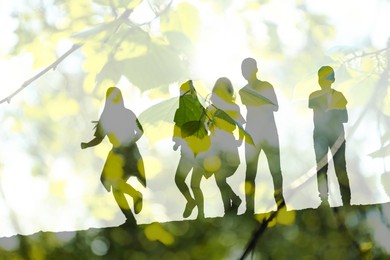 Image of Double exposure of running children and tree branches outdoors