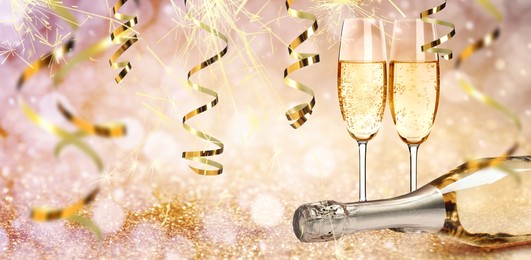 Image of Glasses and bottle of sparkling wine on bright festive background, banner design