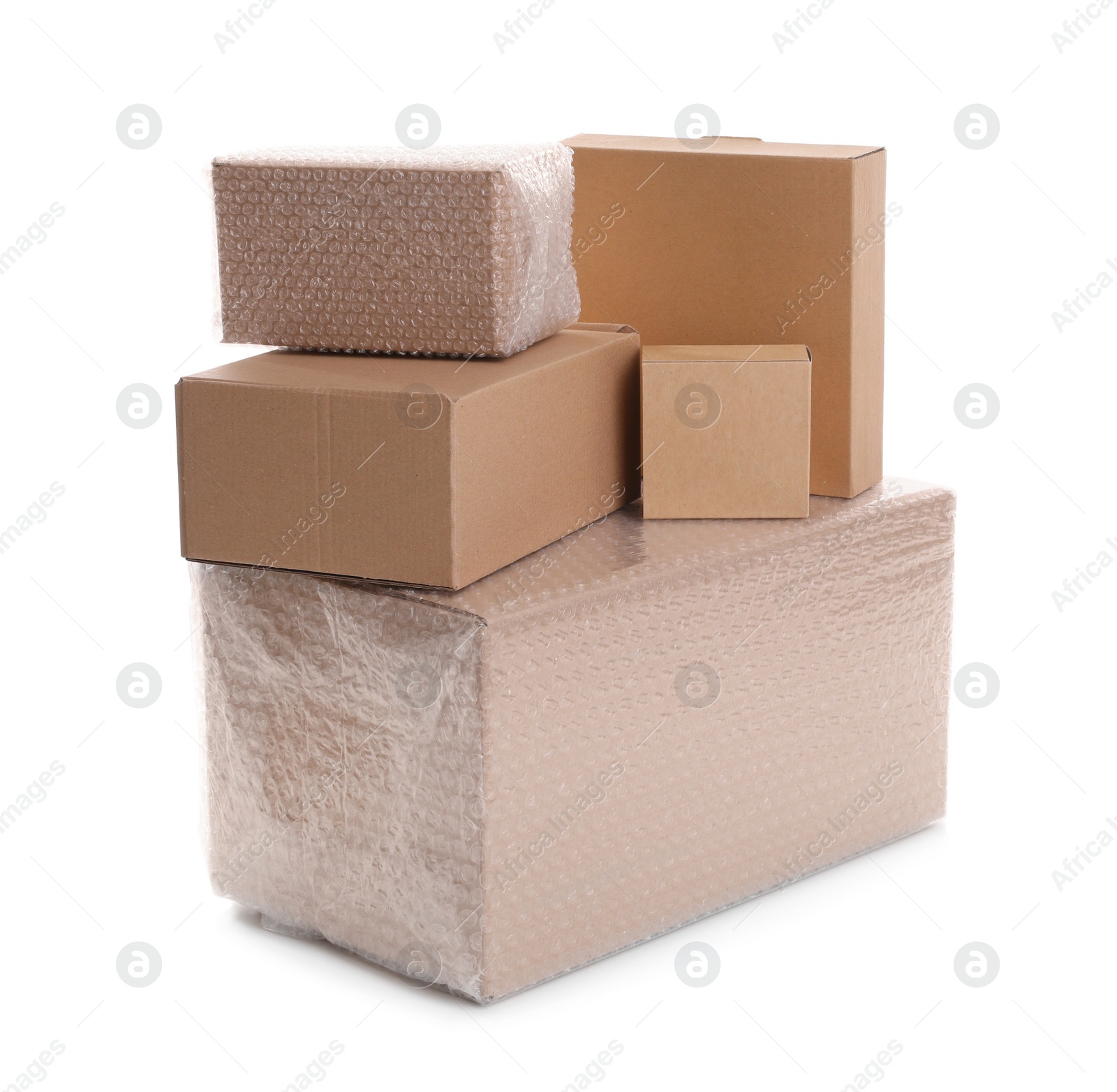 Photo of Cardboard boxes packed in bubble wrap and ordinary ones on white background