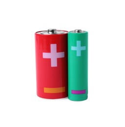 New AA and C size batteries isolated on white